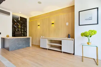 a room with a desk and a wine cellar at Energy 801 in Medellín