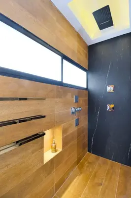 a bathroom with a shower with a glass wall at Energy 801 in Medellín