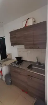 a kitchen with a sink and a counter top at Apartamento vacacional en Medellín central privado y tranquilo in Medellín