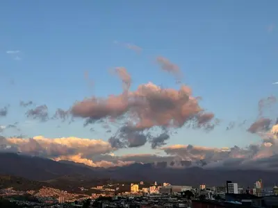 a view of a city with clouds in the sky at MARGARETH in Manizales
