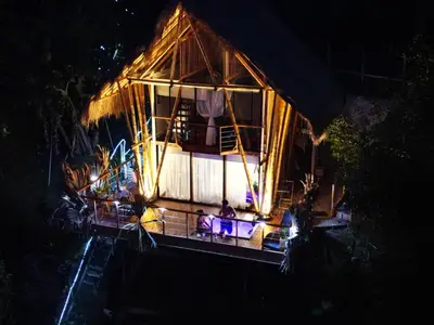 an overhead view of a house at night at Ibuku Hotel Guatapé - Chalets in Guatapé