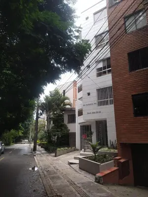 an empty street in front of a building at Conquistadores Romantic, Medellín in Medellín