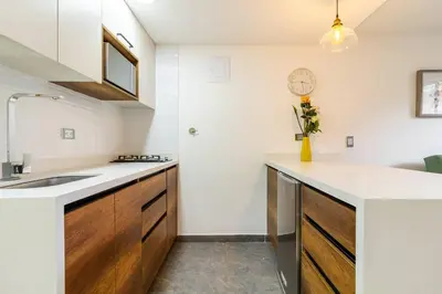 a kitchen with a sink and a counter top at Fabulous studio in the heart of Medellín in Medellín