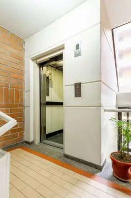 a hallway with an open door to a room at Fabulous studio in the heart of Medellín in Medellín