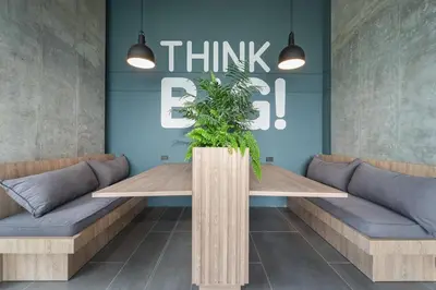 a conference room with a table with a plant on it at Unique Suite in El Poblado CoWork/ GYM / Fast WiFi in Medellín