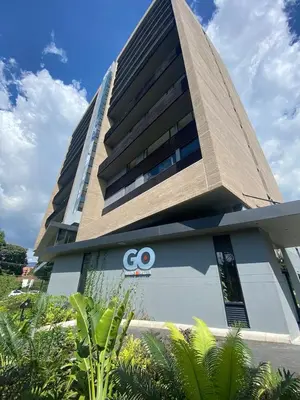 a building with a go sign in front of it at Unique Suite in El Poblado CoWork/ GYM / Fast WiFi in Medellín