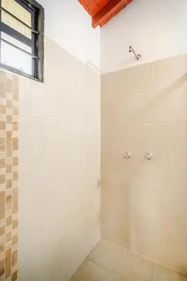 a shower stall in a bathroom with a window at Moderna cabaña en Viterbo con Aire AC y Piscina in Viterbo