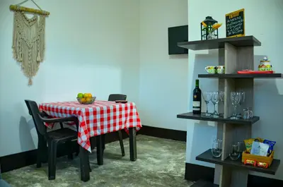 a table with a red and white checkered table cloth at Encanto! Casa de campo en Café de la Cima in Fredonia