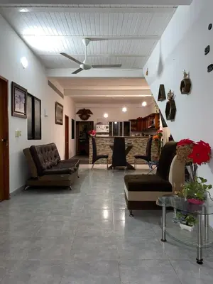 a living room with couches and a table at casa amoblada, Doradal Antioquia, Santorini colombiano in Doradal