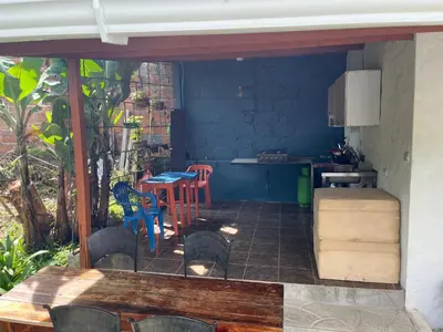 an outdoor patio with a table and chairs at LUzArt in Jardin