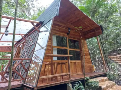a tiny house in the woods at ECO HOTEL RIO DE ORO in San Rafael
