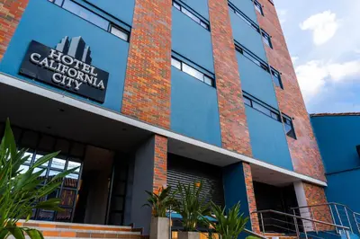 a building with a sign that reads hotel calcutta city at Hotel California City in Medellín