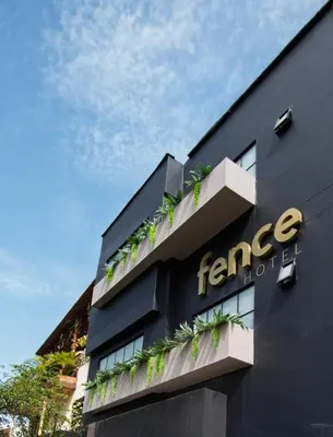 a black building with plants on the side of it at Fence by Bernalo Hotels in Medellín