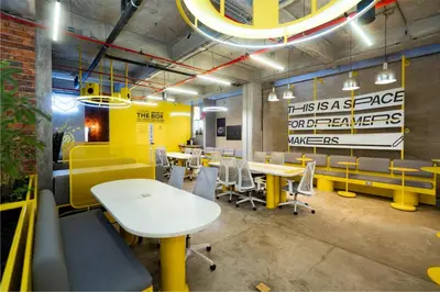 a restaurant with tables and chairs in a room at Indie Universe Creative Hotel in Medellín