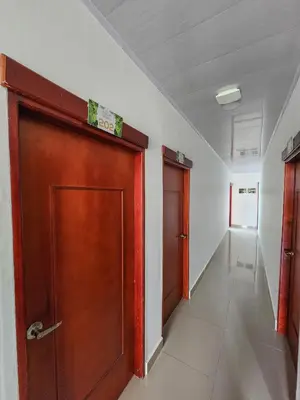 a room with two doors and a hallway at MIRADORES DEL PARAISO in Doradal
