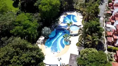 an overhead view of a swimming pool in a resort at Apartasol en San Jerónimo, Ciudadela del Sol - Cammar in San Jerónimo