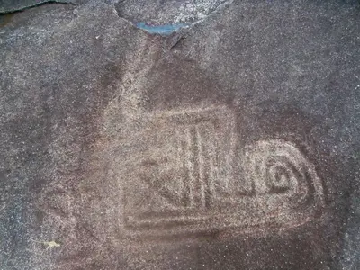 a rock with a picture of a sign on it at Jaibaná Spa in Támesis