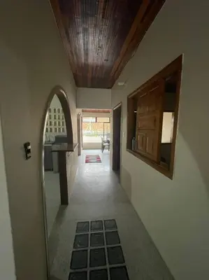 a hallway of a house with an archway and a room at Apartamento La Matiz - Central in Mariquita