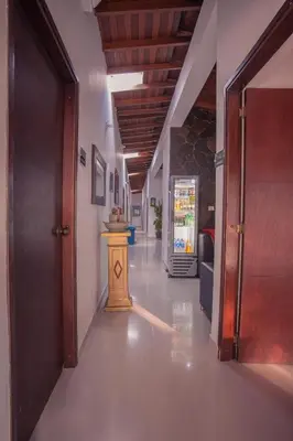 a hallway of a building with at Hotel Palma De Sevilla Medellin in Medellín