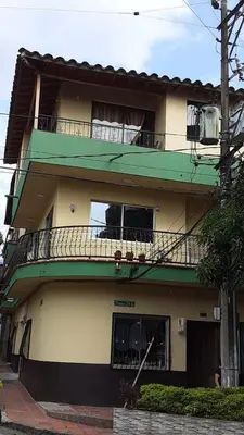 a building with a balcony on the side of it at Apartamento en Envigado in Envigado