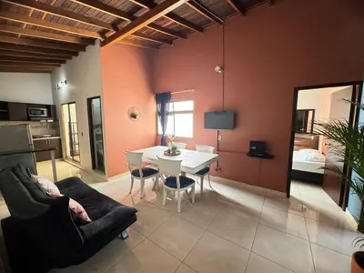 a living room with a couch and a table at Apartamento Relax in Medellín