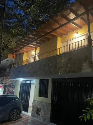 a car parked in front of a house at Cozy house en envigado con Jacuzzi in Envigado