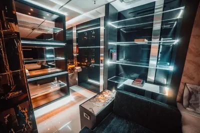 a small room with a couch and a table at 1Million Luxury Suites in Medellín
