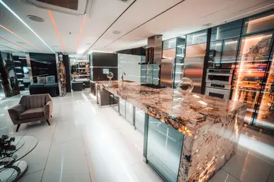 a kitchen with a marble counter top in a room at 1Million Luxury Suites in Medellín