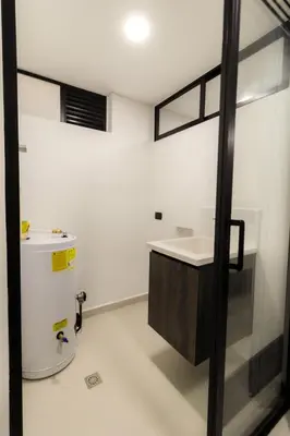 a bathroom with a sink and a toilet at Casa García Rent Home in Guatapé