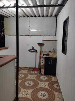 a room with a tile floor in a room at Hermoso apto con excelente vista in Bello