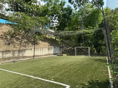an empty soccer field with a goal at Edén de Alejo - Apartamento - Lujo y Confort en San Jerónimo in San Jerónimo