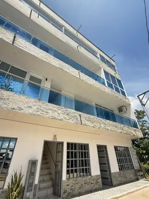 a large white building with a lot of windows at TORRES DEL MESÓN LUXURY APARTA HOTEL Doradal in Doradal