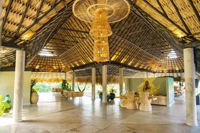 a large building with a large ceiling with a large room at Hotel Piedra Mulata - Adults Only in Doradal