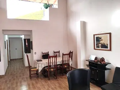 a dining room with a table and chairs at Casa Hotel Castellón in Hispania