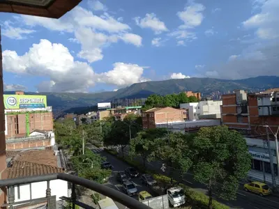 a view of a city with a street and buildings at Hermoso apartamento Medellín in Medellín