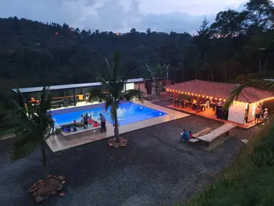 an overhead view of a resort with a swimming pool at La escondida in Guarne