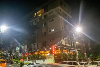 a building on a city street at night at Apartamento en zona exclusiva de Bello, Cabañas in Bello