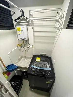 a small room with a washing machine in it at Apartamento en zona exclusiva de Bello, Cabañas in Bello