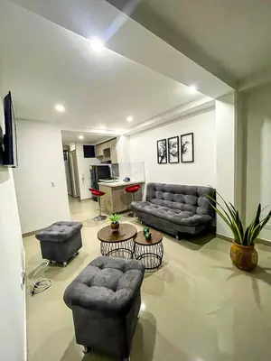 a living room with couches and chairs and a table at Apartamento en zona exclusiva de Bello, Cabañas in Bello