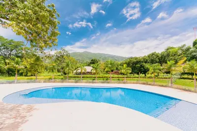 an image of a swimming pool at a house at Apartasol Dominica Citadela Di Sole in Santa Fe de Antioquia