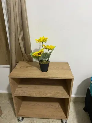 a wooden table with a potted plant on it at 23 BELO APARTAMENTO CON BALCON EN LAURELES ESTADiO 2 HAB 2 BAÑOs in Medellín