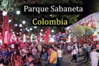 a large crowd of people standing in front of a market at Amplio y acogedor Apartamento Sabaneta. in Sabaneta