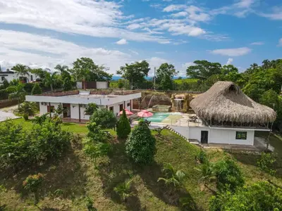 an aerial view of a villa with a swimming pool at Parcela la cascada in Doradal