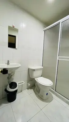 a bathroom with a toilet and a sink at Aparta-estudio amoblado en Medellin, Campo Valdes in Medellín