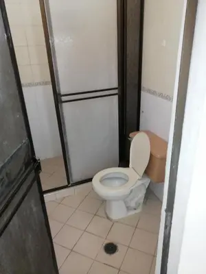 a bathroom with a toilet and a shower at Casa de relajación low cost! in La Dorada