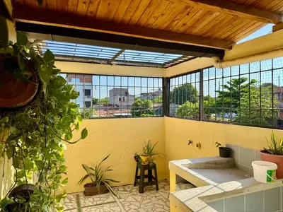a balcony with a view of a city at Sol Apartamentos Doradal in Doradal