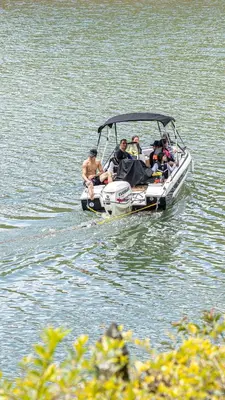 a group of people on a boat in the water at Volare Guatapé isla de descanso y retiro in Guatapé