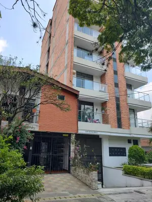 an external view of a brick building at Nora's Casa de familia Laureles in Medellín