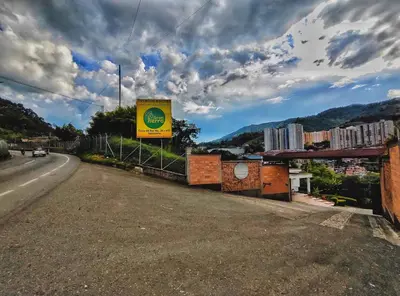 a sign on the side of a road at Gran Tierra - Sabaneta in Medellín