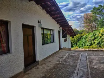a building with a door on the side of it at Gran Tierra - Sabaneta in Medellín